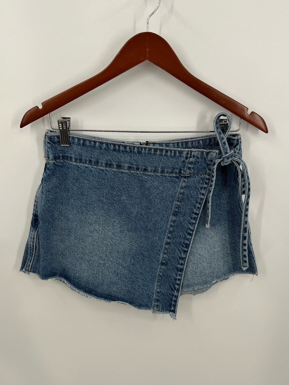 Free People Emmy Denim Faux Wrap Mini Skort with Side Tie - Picture 2 of 12